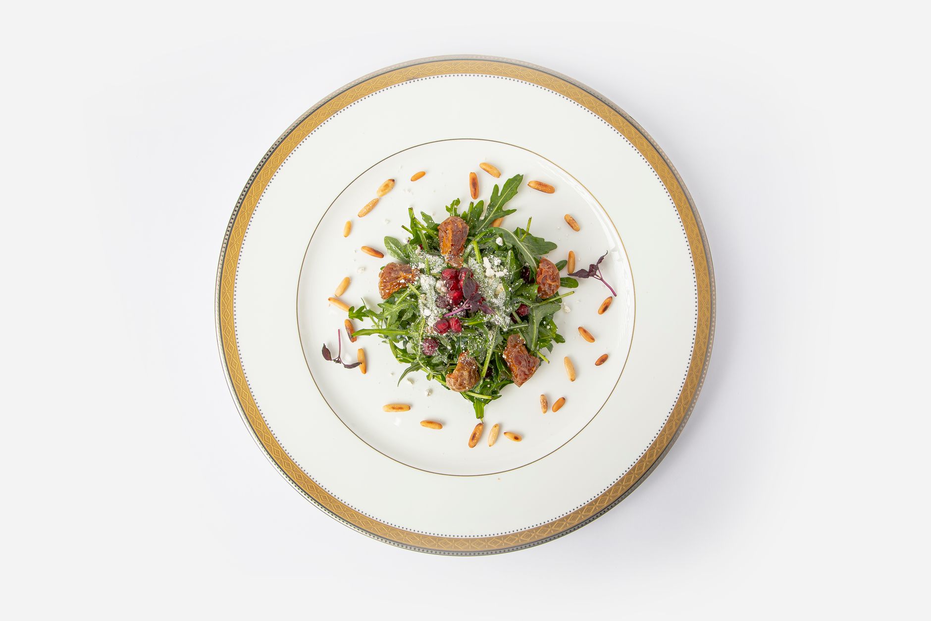 Rucola met parmezaan en pijnboompitten