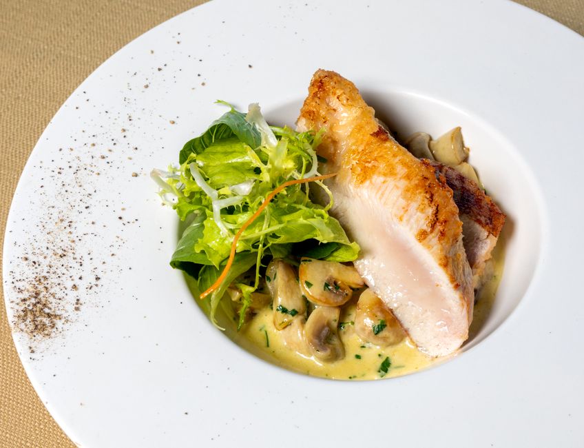 Kipfricassee met champignons